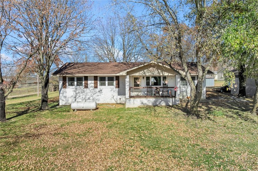 Four-bedroom, one-bath brick home on 1 acre with a peaceful country setting. Enjoy incredible views, large outbuildings for storage or hobbies, and newly updated wood flooring throughout. This one has space, charm, and room to grow — don’t miss it.