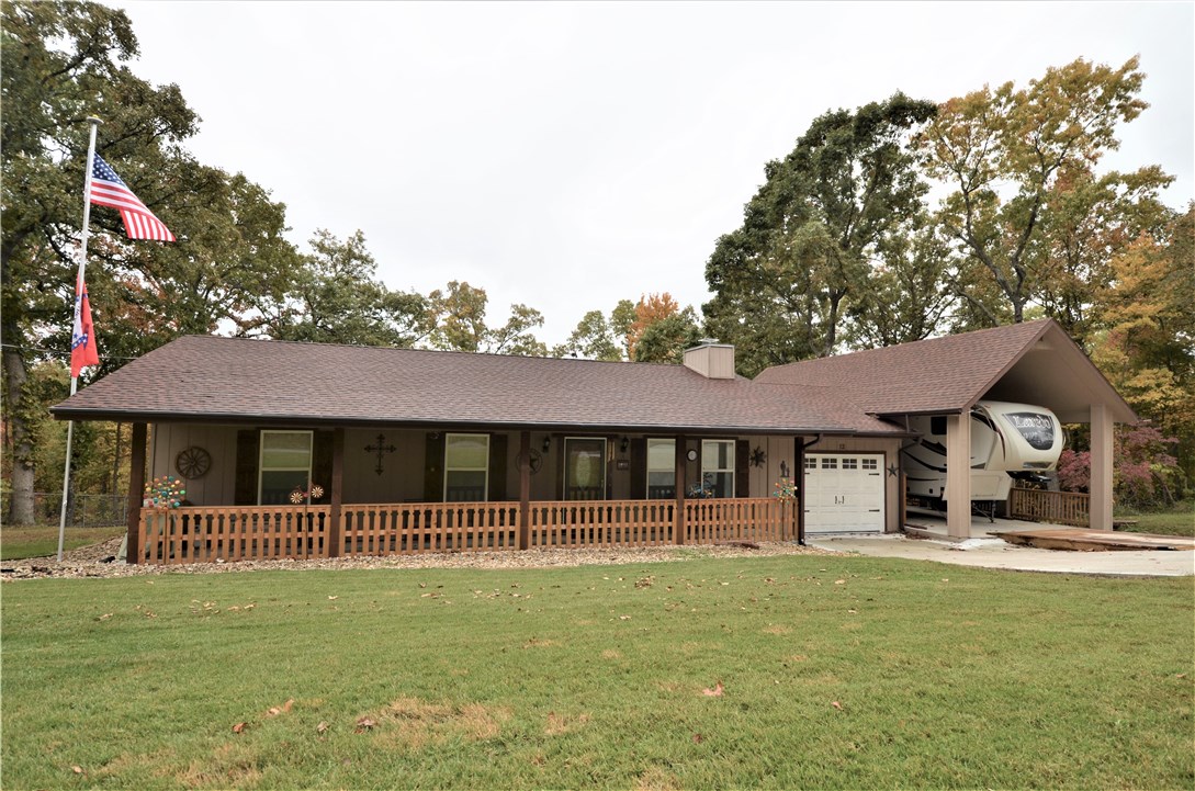 This Eye Catching Wonder Is Waiting For You To Come Sit On The Newly Rebuilt Deck Or Large Front Porch And Relax With Nature. There Have Been So Many Updates To This Home You Can Say Its Almost Brand New. New HVAC, Roof, Water Heater, Windows, Flooring, Appliances, Doors, Gutters, & Driveway Plus An Amazing RV Car Port And A Brand New 14x28 Shop In The Back Yard! Nice Brick Fireplace In Living Room. Gorgeous Counters In Kitchen w/ SS Appliances. Good Size Master. TV's Convey!. Put This On Your List!
