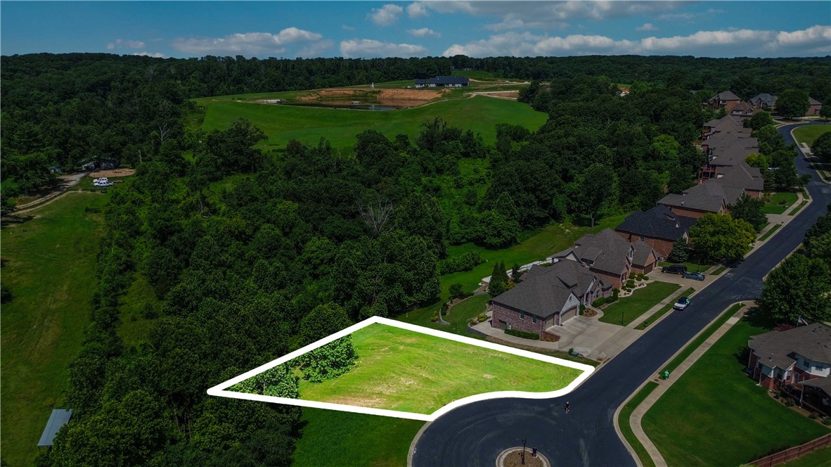 This beautiful 0.46 acre cleared building lot in NW Bentonville's Windemere Woods subdivision is a rare find! Build your dream home on this quiet cul-de-sac and enjoy the views of the peaceful valley below. This is the perfect location - close to the new bike lift, all walking & biking trails, the Razorback Greenway, shopping, restaurants. Nearby I-49 affords access to anything & everything NW Arkansas has to offer. The new WM Campus, Bentonville Square, Museums, Bella Vista lakes & golf courses are all within a 5-mile radius. Bentonville Schools. Donāt miss this amazing opportunity!