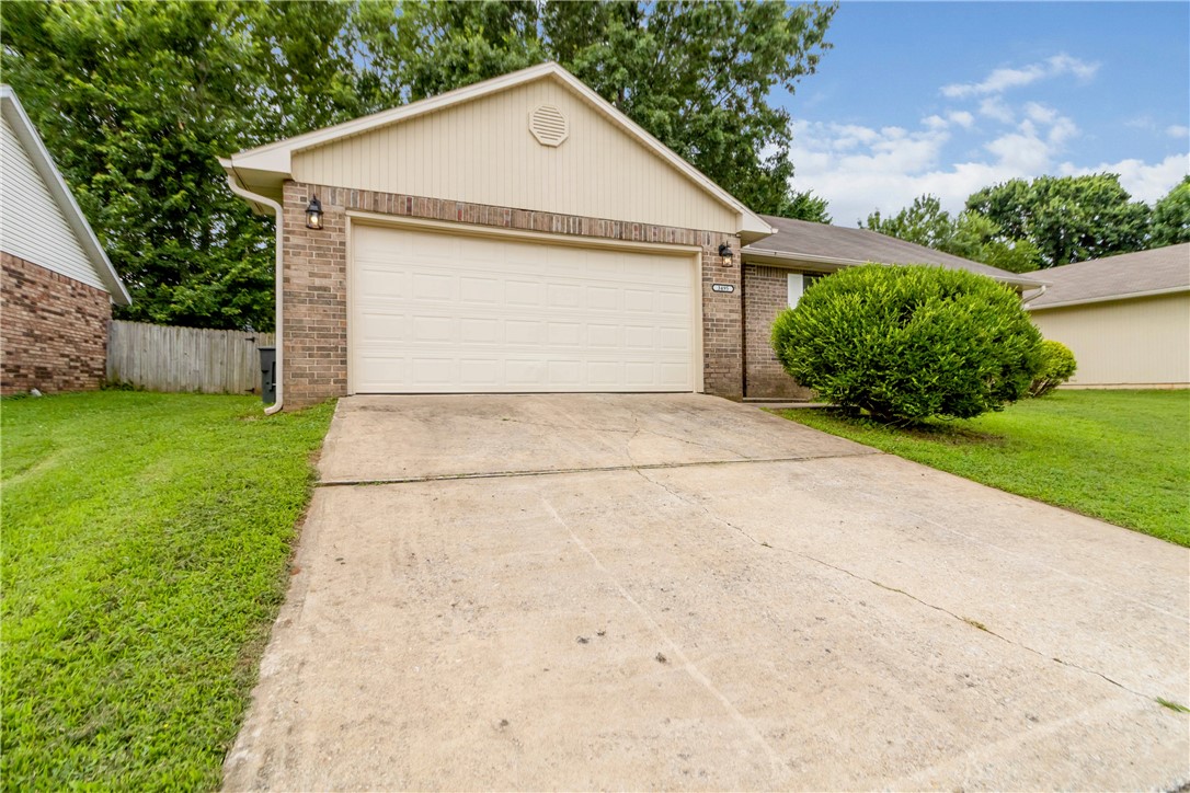 Recently updated 3 bed 2 bath home, minutes from I-49 and the University of Arkansas. This single level home features a large open living area with a spacious garage, and full kitchen. The primary suite includes a private bath and walk in closet, while the other two have immediate access to a shared bath.