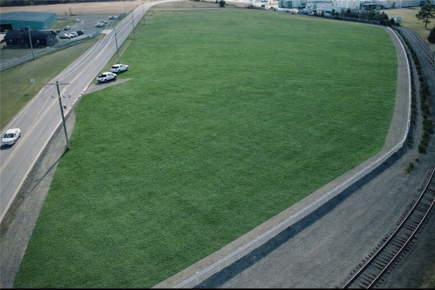 This rail-adjacent, shovel-ready site sits within an established industrial park next to aerospace and defense manufacturing and is fully served by Entergy Arkansas (electric), City Corp (water/wastewater), and Summit Utilities (natural gas), while also being located in a designated Opportunity Zone. The site offers exceptional multimodal access—1.7 miles from Interstate 40, 0.7 miles from US Highway 64 and AR Highway 124, 0.6 miles from Russellville Regional Airport, 78 miles from Bill and Hillary Clinton National Airport, 5.1 miles from the Port of Dardanelle, 82 miles from the Port of Little Rock, and 4.9 miles from D&R Short Line Rail—making transportation and logistics highly convenient for industry.