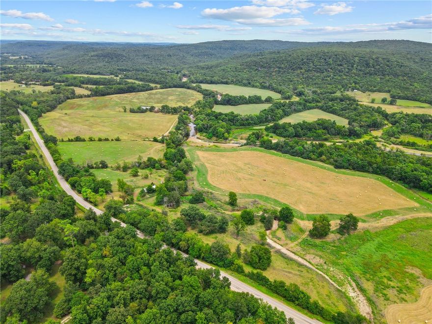 Rare opportunity for over 100 acres with over 3,000 ft of White River frontage! This lovely property is partially wooded with beautiful pastures producing high quality hay. Structures include two barns and a house built in 1895 conveying at no value. Renovations have begun on the house, including a new metal roof, new electrical system, and new septic system. Come see and imagine the countless possibilities for this exceptional property!