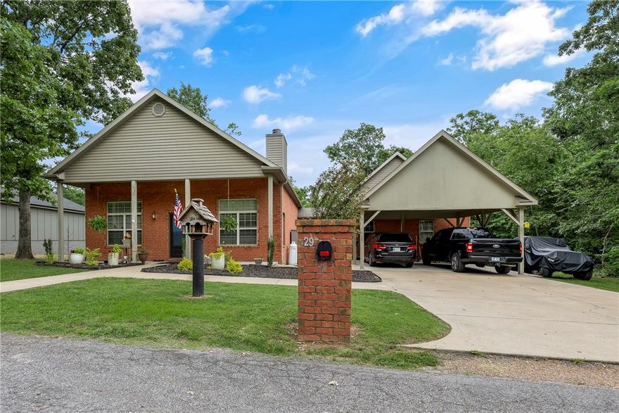 Welcome to your private escape in Bella Vista, Arkansas! Tucked away at the end of a quiet street & surrounded by mature trees, this beautifully maintained 4-bedroom, 2-bathroom home offers 2,850 square feet of serene living space on a generous 0.31-acre lot. Inside, tall ceilings & an open, airy layout create a sense of space & comfort throughout. The spacious primary suite is a true retreat, featuring a large walk-in closet, a tiled walk-in shower, & a dedicated built-in vanity room, offering both style & functionality. A versatile bonus room, already wired for a projector, adds the perfect flex space for a media room, home office, or playroom. Step outside to the expansive deck, completely redone in 2023, ideal for relaxing or entertaining while enjoying the peaceful, wooded surroundings. Enjoy all that Bella Vista has to offer with access to golf courses, recreation centers, scenic trails, tennis courts, workout facilities, & vibrant clubhouses all just minutes from your doorstep. Septic pumped 11/2024.