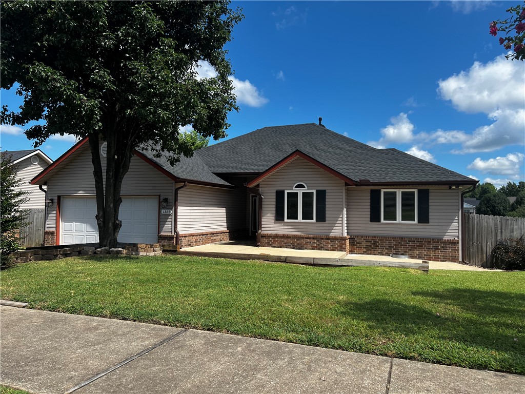 This beautiful 3 Bed / 2 Bath home is located just 3 miles from downtown Rogers and Beaver Lake in a non-poa/hoa neighborhood. New roof as of June 2025 with leaf filter gutters, Fully finished walk-out basement with new mini split heating/cooling system and new floors as of June 2025, New flooring upstairs in the living room and hallway as of June 2025, All new kitchen appliances and washer/dryer, New Rheem water heater as of 2024, Cathedral ceilings with large windows, Landscaped front yard, Landscaped backyard with access from walk-out basement, Oversized garage with insulated door and 220v power, Large 12' x 16' detached storage building are just some of the features you'll enjoy. Don't miss the chance to call this beautiful property your new home!