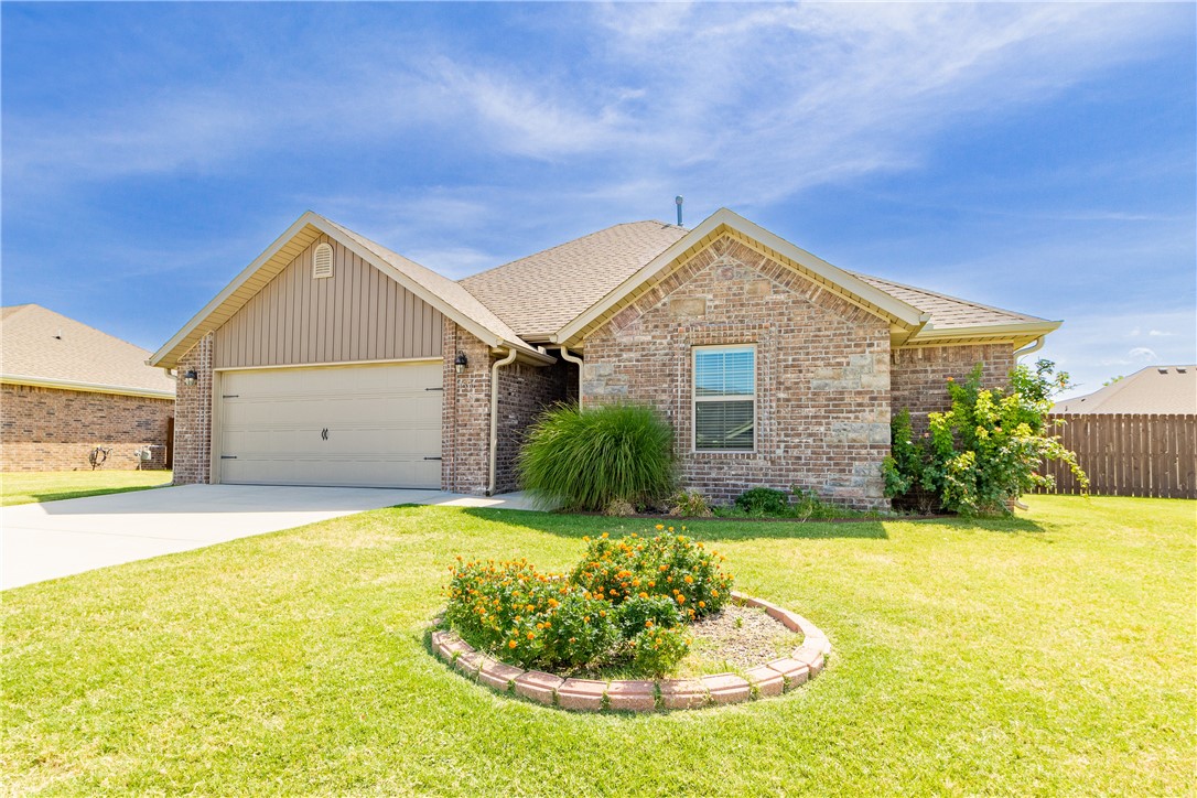 Beautiful, well maintained home built in 2017. Located just minutes from the lake and aquatic center! Features include wood floors, split floor plan, large kitchen w/ island, custom cabinets, granite counters, gas range, 10' ceiling, and an open living/dining area. Sizable backyard and covered patio are perfect for entertaining friends. Schedule your showing today!