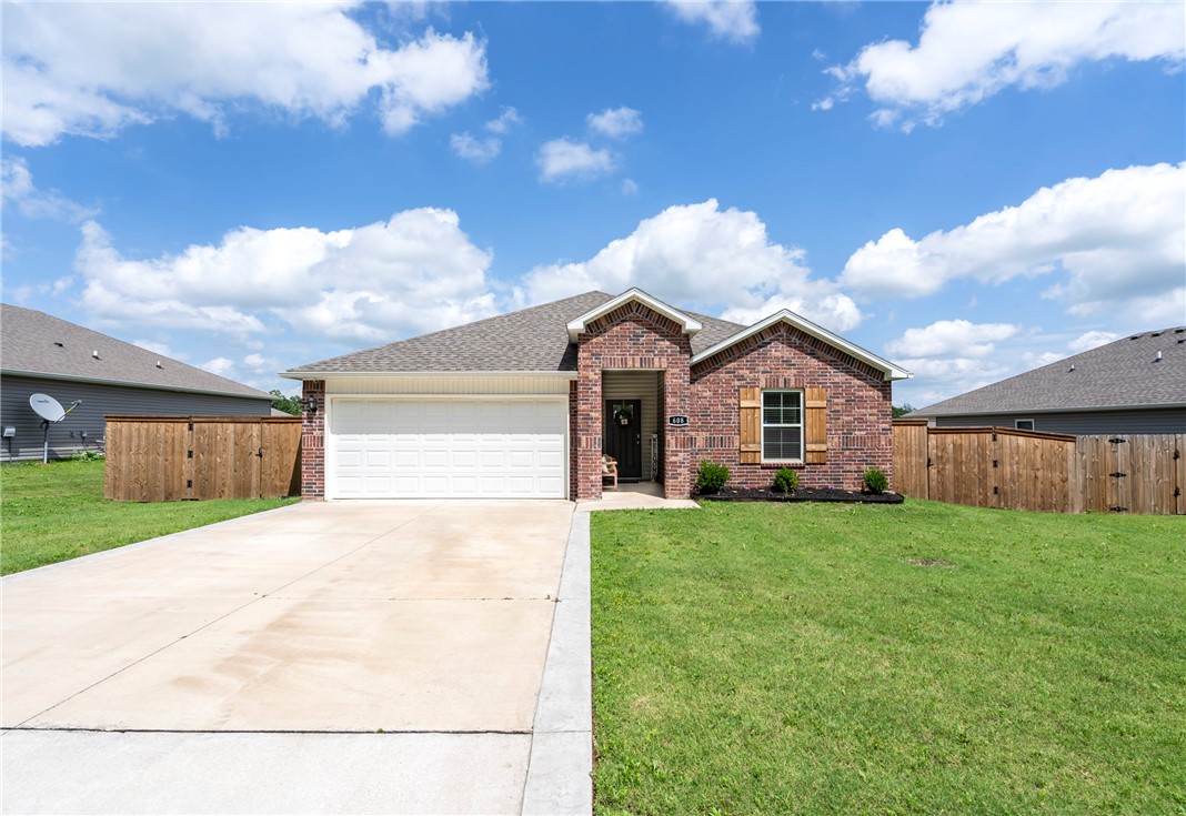 WELCOME HOME! This well maintained 4 bedroom 2 bathroom home conveniently located near parks, Schools, is a short drive to Highway 59. From the covered front porch head inside to an open concept living space! Spacious kitchen with white cabinetry, granite countertops, tiled backsplash, stainless steel appliances, and large center island with sink & room for seating opens up to your dining space and vaulted ceiling in a spacious living room with luxury vinyl plank flooring! Relax and rejuvenate in the enlarged primary suite with private ensuite feat: dual sink vanity, built-in shelving, shower, & walk in closet! Enjoy an additional three bedrooms and one bathroom Head out back to the oversized partially covered back patio overlooking the fenced in back lawn perfect for the spring & summer months. BONUS this property features a garage storm shelter and whole home generator! Don’t Miss Out! Act Now!