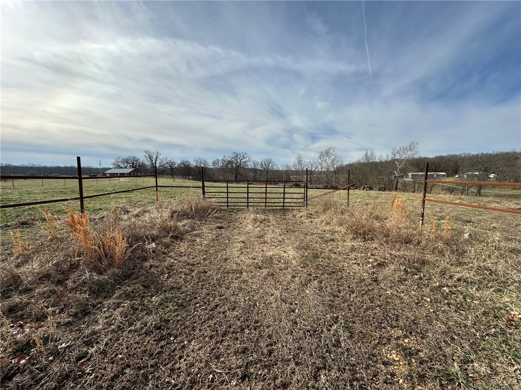 Looking for a spot to build your dream home? This property is close enough to town for shopping and dining but far enough for the peace and quiet! Property has septic, well and electrical already on site! Footings for mobile home are on site.