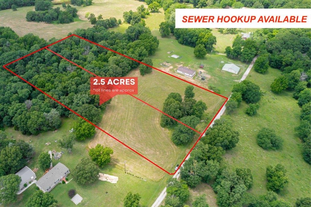 Gorgeous 2.5 Acre Home Site in Decatur! Secluded out of city feel but with the convenience of having public water, SEWER, and electric at street! Save time and money on your build with sewer access. A rare find for acreage! Located off 102 for quick travel to Centerton and Bentonville. This spacious property has a beautiful setting with a wooded boundary as well as a large open space ready for your dream home! Located in Rurban neighborhood, have the freedom to build your home, shop, hobby farm, or more! Donāt miss out on this amazing property! Current 5 Acre Parcel in process of lot split, final parcel and lot number TBD. Full 5-acre parcel also available for sale, see MLS#1249277. See additional 2.5 Acre listing at MLS#1255851.