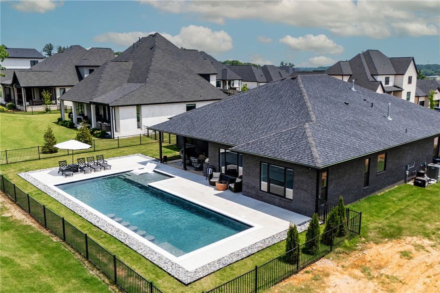 Right on the 14th fairway with a front-row view and a heated, extra-long pool that's practically brand new—this one brings the wow factor fast. Tucked inside Shadow Valley Phase 10, a gated community known for its quiet streets and golf course access, this single-story home blends ease of living with just the right amount of luxury. Whether you're poolside or watching the action on the course, the setting does most of the talking.