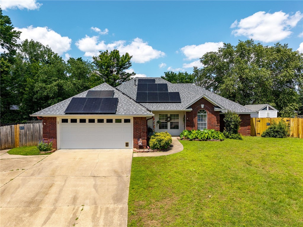 Private Oasis with a Dream 3,240 sq ft Shop on Nearly an Acre in Van Buren.Welcome to this one-of-a-kind 3-bedroom,2-bath home on a quiet cul-de-sac.1,877 sq ft open split floor plan home offers privacy,space & stunning natural beauty.Main Home Features Open & bright interior w vaulted ceilings & abundant natural light.Updated Chef's kitchen w gorgeous granite countertops,breakfast bar, gas range & new cabinetry.Spacious living room has a cozy gas fireplace.Primary suite includes 2 walk-in closets & a remodeled spa-like bathroom-dual vanities & walk-in tiled shower.Outdoor Living Oasis: Covered patio,Trex deck perfect for relaxing or entertaining,Tranquil views of Cedar Creek w your own private walk bridge surrounded by natural wildlife.Shop & Guest Quarters 60x40 shop w electric,water & bathroom.2 rooms on Upper level ideal for a guest suite/office. Add 31x18 garage w electric/water.RV parking/hookups tons of space for vehicles,boats,equipment.In-ground storm shelter, Solar panels 1 yr old,New Roof.1 mile to I-40