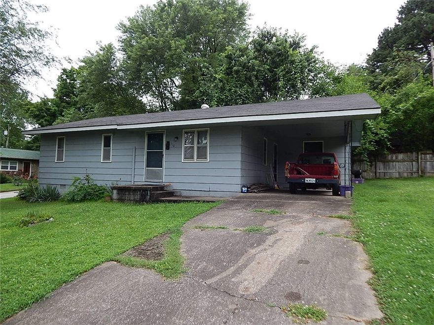 3BR, 1BA home on a corner lot, with one car carport, storage room off carport, CHVAC, all electric home, great starter home, located around the corner from city pool, tennis courts, park, close to downtown square.
