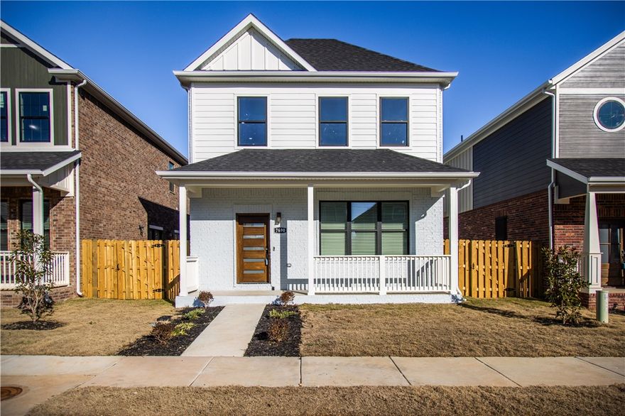 Welcome to this brand-new 4-bedroom, 3.5-bath modern farmhouse, thoughtfully crafted with style and functionality in mind. The open-concept living, kitchen, and dining spaces feature soaring ceilings and large windows that flood the home with natural light, creating an airy and inviting ambiance. The main-level primary suite offers convenience and privacy, while the upstairs bonus loft provides versatile space for a home office, playroom, or additional living area. Designed for modern living, this home includes laundry hook-ups on both levels to streamline daily tasks. Step outside to enjoy the covered front porch, a private fenced side yard, and the added benefit of a community park and playground nearby the home. The 2-car garage offers ample storage for all your needs. Located near HWY 112 and HWY 412, this home offers easy access to everything Northwest Arkansas has to offer, from schools and shopping to dining and recreation.