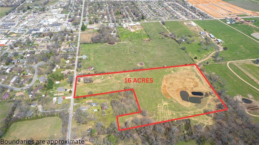 This rare 16-acre offering—made up of three parcels—is perfectly positioned just minutes from the town's central 4-way stop. With flat, buildable land, city water and sewer already onsite, and a home currently located on the property (assigned no value), the possibilities are endless.  Located around the corner from a newly developing subdivision and the future Tractor Supply site, this property offers prime access to Pea Ridge’s rapid growth. Just a short 15-minute drive to the new Walmart Home Office campus, this is a prime location for residential development!