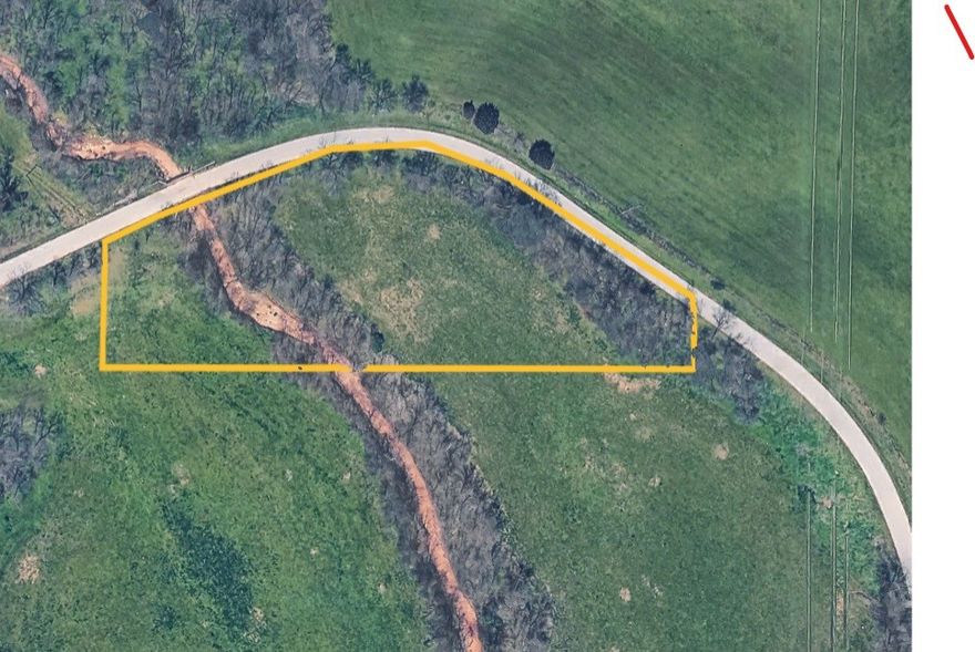 3 acres in the Spavinaw Valley to build your dream home. Rural water on site. Mostly wet creek running along property. Paved frontage.