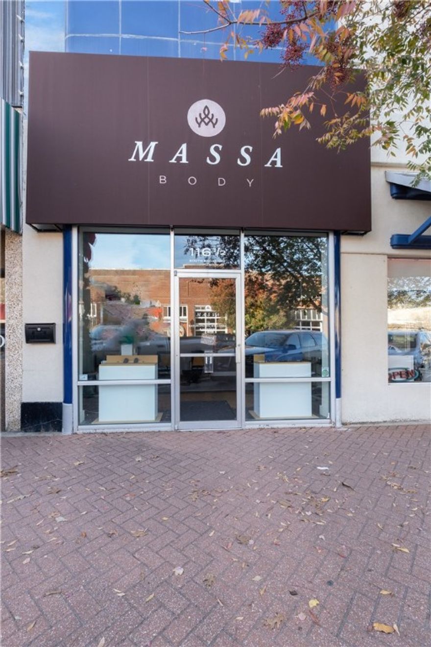 Discover +/- 630 SF of prime retail space available in the heart of historic Downtown Siloam Springs! This charming space boasts high vaulted ceilings, expansive storefront windows for maximum visibility, a spacious reception area, a semi-private office, dedicated storage, and a private restroom. Perfectly situated in the bustling downtown district, this location offers a fantastic opportunity for businesses to grow and succeed in a vibrant, high traffic area. Don't miss your chance to establish your business in one of Siloam Springs' most desirable spots!
