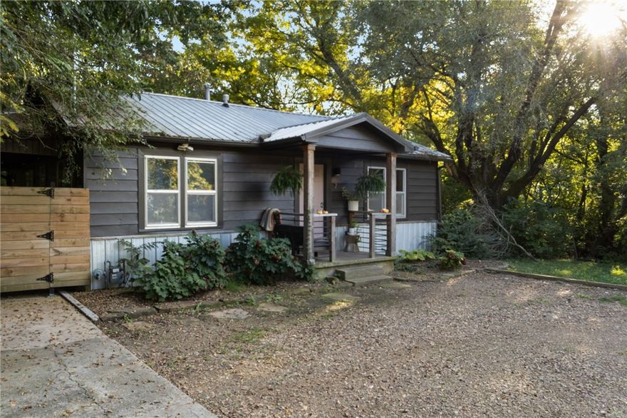 Embrace urban living in this vibrant 2BR/2BA remodel on .30 acres, right in downtown Fayetteville! Perfect for short or long-term rentals, steps from Walker Park and the city buzz. With recently fully updated bathrooms, paint, flooring and a metal roof installed to boot! It's your ticket to NW Arkansas' booming market, offering endless potential for savvy investors hungry for growth and development opportunities. Let's make it yours!