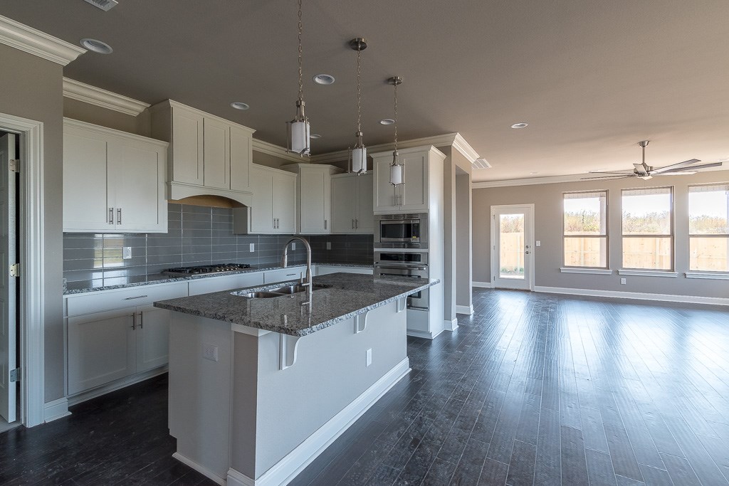 Neighborhood pool, baywindow in master bedroom, 3rd car garage, 4 bedrooms plus an office and a bonus room. Crown molding, granite, hardwood floors, epoxy floor, blinds through out and privacy fence

Stevenson Elev D