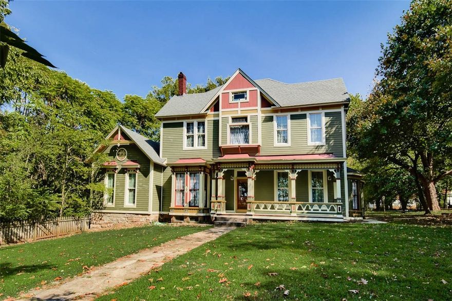 The Davidson House: This fully restored/renovated 1859 historic home is a true Victorian gem. It could serve as a fantastic B & B or be a forever home for folks who would enjoy owning a piece of Fayetteville history. A grand entrance leads to a parlor, family room/den/library, a large home office/4th bedroom, a formal dining room, half bath and a fabulous cook's kitchen. A large staircase leads to 3 full bedroom suites on the 2nd floor. A second staircase leads to 1200 square feet of high ceiling, unfinished attic space (ready to be made in to additional living space). Attention to details is evident throughout. This home sits on a 1.39A lot w/ mature trees and a level expanse of lawn. An additional .39A lot of woods and creek bed is part of this listing, as well. = total 1.77 acres. Within walking distance to the Square, grocery, Dickson Street and various other businesses is a solid perk. Over decades, the present owner restored this home to its former glory. It is time for someone to become its new caretaker!