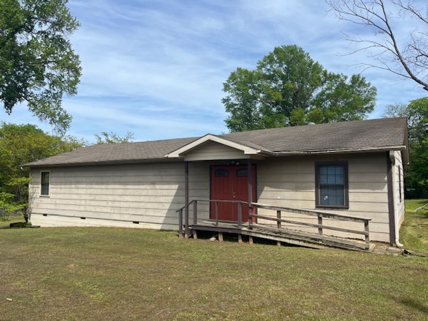 This former church building offers a unique opportunity on a spacious corner lot just minutes from downtown Russellville. With an open interior and flexible layout, the property is a true blank slate ready for your vision—whether for community use, retail, studio space, or redevelopment. High visibility, easy access, and a generous lot size make this location ideal for a wide range of possibilities. Bring your ideas and make this versatile property your next project here!