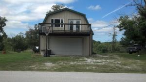 Garage with apartment above - View. Is unfinished.