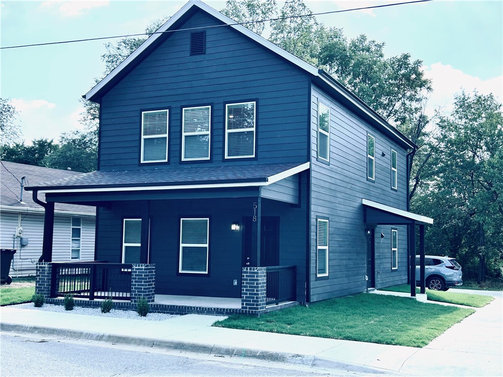 Enjoy modern living in downtown Springdale! This is the first floor of a stacked duplex. 1st and 2nd floor units have same layouts and finishes. These brand new two bedroom, 1 bath homes offer open concept layouts with high-end finishes. This townhome features: A modern kitchen with granite countertops, stainless steel appliances, pantry, washer and dryer, spacious closets, and so much more. Steps away from Luther George Park and only minutes away from the vibrant downtown area. Walk or bike to local shops, restaurants, concerts, and the ongoing revitalization that's bringing new energy to the area. More of these will be available for lease within the next few months. $1,250 per month with a $1,250 deposit. 12 month lease. Pet friendly with an additional deposit. Please be aware of scams. Application process is to be paid online through a secure portal.
