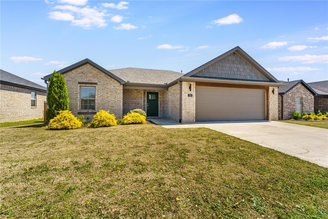 This beautifully upgraded home in West Springdaleās desirable Morsani Acres subdivision offers the perfect blend of modern style and comfort, all in a newer neighborhood with homes built in the last few years. Inside, youāll find durable wood-look tile flooring, vaulted ceilings, a cozy gas log fireplace with a shiplap surround, and a kitchen that stands out with 3cm black granite countertops, a stainless farmhouse sink, and sleek stainless appliances. The split floor plan is ideal for both everyday living and entertaining, flowing effortlessly into the open-concept living space and out to a covered back patio that overlooks open farmlandāno neighbors behind you, giving the backyard a peaceful, private getaway vibe youāll love waking up to. Custom touches like a tiled walk-in master shower, accent walls, and an oversized insulated 18ā garage door for comfort and functionality make this home truly one-of-a-kind. Donāt miss your chance to own a rare find in West Springdaleāschedule your showing today!