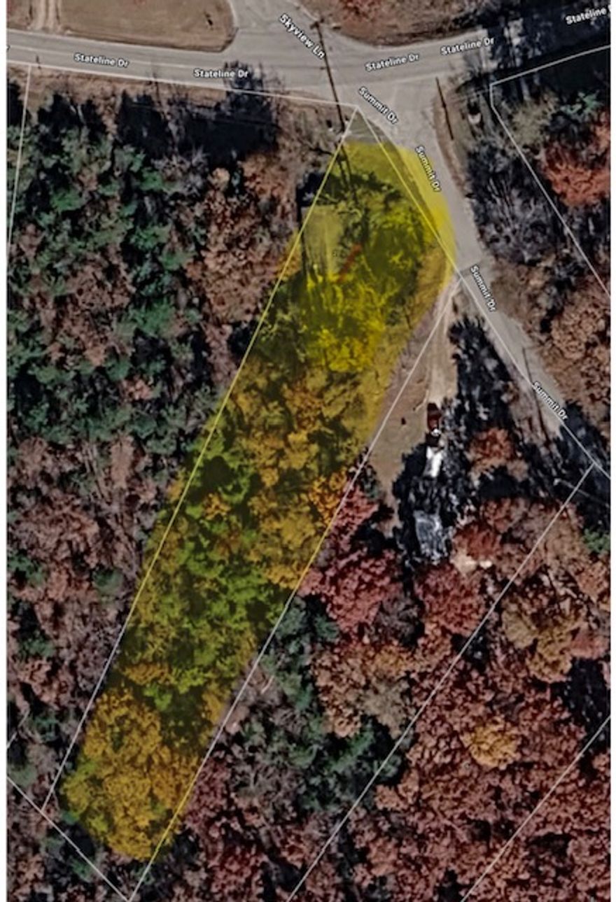 Almost 1 acre to build or place a mobile home on! All utilities on site. Great corner lot in Beautiful Holiday Island.