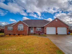 BEAUTIFUL move in ready home, one level, close to schools and shopping. Large level lot with great back yard. Large kitchen with custom cabinets and pantry. The spacious master bedroom has a 5 piece master bathroom. The large walk-in closet has custom shelving and clothing storage. Wood privacy fence, nice back deck, 24 X 16 attic space for storage OR make into another bedroom or living space! The framing for a door from the breakfast nook is there for an entrance from the inside the home. Current entrance is from the Oversized garage with room for a workspace/storage. Must see home! Beautifully maintained.