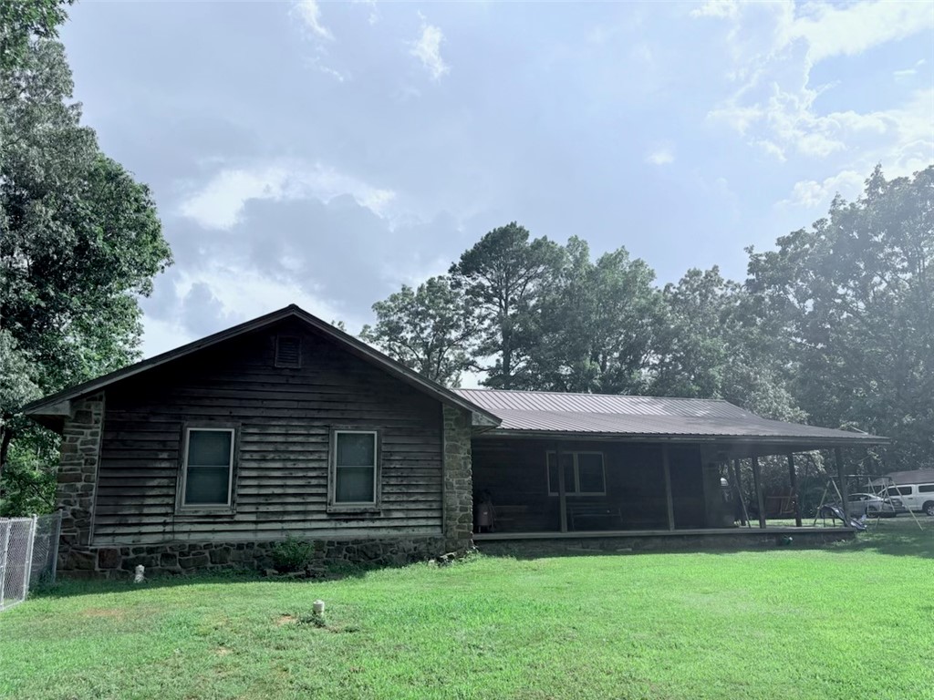 Rustic Charm on Nearly 8 Acres!
Enjoy peace and privacy in this charming 3 bedroom, 2 bath home nestled on 7.93 acres of serene countryside. The rustic-style house features a welcoming front porch perfect for morning coffee, a carport for convenient parking, and multiple outbuildings for storage or hobbies. Surrounded by nature, this private setting offers the quiet, country lifestyle youāve been looking forāyet still within reach of town amenities. Donāt miss this one-of-a-kind opportunity!