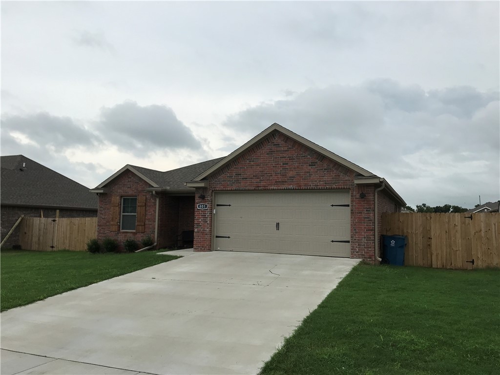 Newer home convenient to XNA Airport, three bedroom, two bath, two car garage, fresh paint with privacy fence. Brick home with open floor plan.