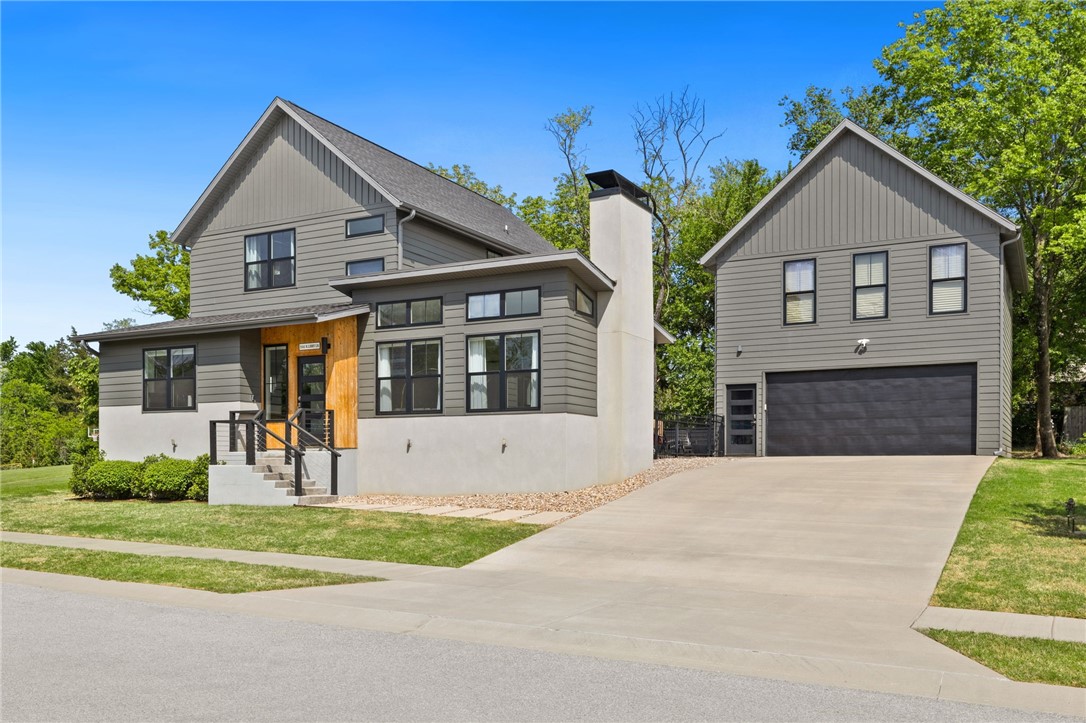Contemporary & beautiful home in the desirable Whistler Woods Subdivision. As soon as you enter this stylish home you are greeted with an abundance of natural light from all the windows, a functional floorplan, & modern finishes. The living room has built in shelves & a gas fireplace. The living space is separate from the kitchen & dining room, but still offers an open feeling. The eat-in kitchen has a large center island, bright quartz countertops, open shelving, & 2 pantries. Also downstairs, you will find a mudroom with storage, large laundry room, full bathroom, bonus/office that is currently being used as a 4th bedroom, & the primary suite with an impressive bathroom. Upstairs you will find 2 more nicely sized bedrooms with newer carpet, a bathroom, & a second living space. Enjoy hanging out in the great outdoor area. Separate oversized garage with new polytek floor. Unfinished bonus space over the garage is an additional 670sf stubbed & framed space that would make a great additional living space if finished!