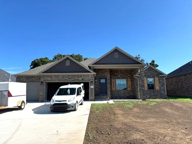 Brand new all-brick home featuring 1,485 SF, 3 BR, 2 BA, and 3 car garage! Split bedrooms, built-in bookshelves, gas fireplace, premium vinyl plank floors, granite tops, gas cook stove, large pantry and large covered porch. Fully sodded yard, fenced backyard. Seller will pay $2,500 of buyers closing cost and prepaids!