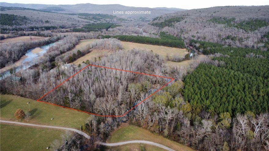 +/- 8.2 Acre Mulberry River lot across the street from Turner Bend. This property is situated in one of the Mulberry river’s best floating stretches. Water and electric at the access road with deeded access via shared gravel road. Just 13 miles north of I-40 on scenic Hwy 23. Enjoy Ozark National Forest views, waterfront serenity, and the sound of the river from your future deck or cabin site.  Wet weather creek/ slough located on south line. A rare chance to own prime riverfront property in the Ozarks.

The land will need to be surveyed prior to closing.