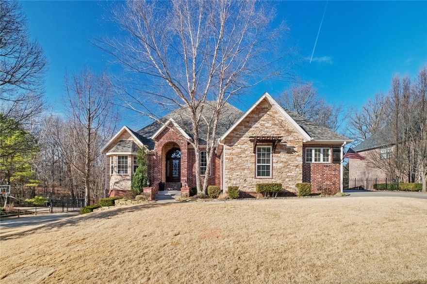 Wowza, talk about location: This stunner of a home is situated right next to Crystal Bridges and Enfield Park, walking distance to Memorial Park and just a short walk or bike ride to Bentonville square. The new Walmart HO is only a a few minutes away. Bike trails are literally at the back of the property, Slaughter Pen trails are only 1.8 miles away, and several other trails are just around the corner. Featuring a large .56 acre flat, fenced lot with multiple outdoor spaces overlooking the Crystal Bridges Northern Forest Lights. Custom features include distressed hardwood floors and polished concrete, a spiral staircase imported from the Dallas Design District, Commercial grade Viking appliances, 2 laundry rooms, second large lower level living space with bar, 2 gas log fireplaces, and tons of custom trim work and other features. Need garage space? Well this home has an upstairs 3 car garage with a car lift and lower level 2 car garage with tons of space for 2+ vehicles and other toys.