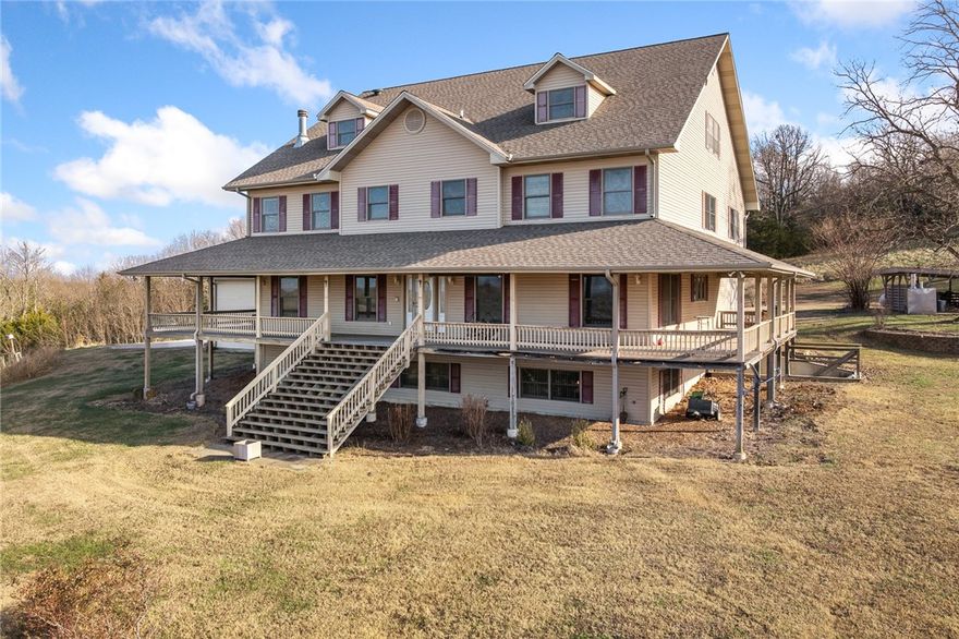 One-owner, custom-built home offering incredible space, privacy, and views in the heart of North Arkansas. This stunning property features 6 bedrooms plus a bonus room, 4 full baths and 2 half baths, and was thoughtfully designed for comfort, durability, and entertaining. The home includes an in-house sprinkler system, whole-house generator, outdoor Hardy wood furnace, propane cooktop, multiple HVAC systems, and a brand-new roof in 2023. A spacious three-car garage and solid construction throughout reflect the quality of this build. 

Buyers have the option to purchase the home with ~10 acres or expand to ~40 acres, which includes a pond and barn. The setting offers absolute privacy, tons of usable space, and breathtaking views from every level in every direction. Located just outside Big Flat and Harriet, with convenient access to both Marshall and Mountain View, each about 30 minutes away. A rare opportunity to own an exceptionally well-built home with flexible acreage options in a truly special location.