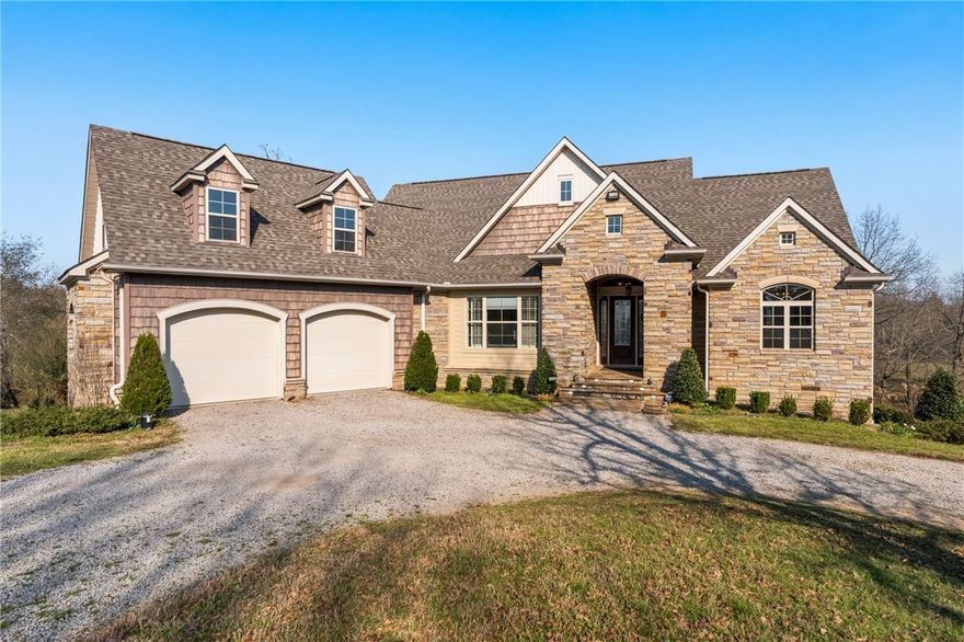 This home features a sun-filled office & a beautiful kitchen featuring granite countertops & lots of cabinets. The primary suite offers dual closets, a spa-style bath with soaking tub, walk-in shower, & heated floors. The main living area has a fireplace & opens to three covered patios. Downstairs provides a large living room, two bedrooms, two full baths, storage, 6" reinforced concrete basement walls for strength & durability. A storm shelter/safe room with 6-inch concrete walls adds another layer of security rarely found in residential construction. Additional features include: Generac backup power system, New roof, Security system, Media room, Enclosed carport on concrete pad, Walk-in safe, Storage throughout. This property is ideal for those needing room to live, work, store equipment, or operate from home without limitations. This property also features a 40x80 insulated & heated shop/garage with 4-6 spaces, RV storage, full kitchen & bath, overhead doors, vacuum system & ventilations fans.