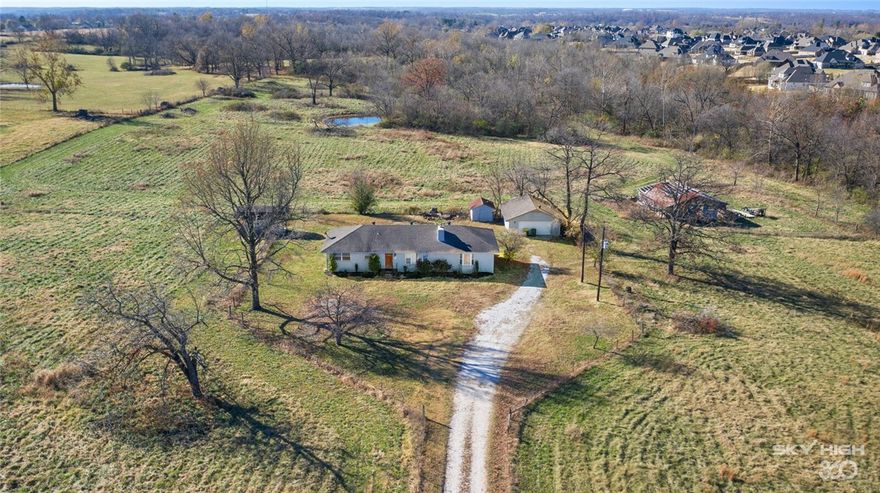 Located in one the fastest growing areas of NWA, this 18.8 acre tract is located right off S. Rainbow Road with quick access to I-49. Don’t miss this rare investment opportunity that has development potential or create your own private wooded estate with scenic view of pond and wet weather creek. Property features a completely remodeled 1,674 sq foot 4 bedroom, 2 full bathroom home with 2 car detached garage/workshop and storm shelter. Property has additional outbuildings and northern border of property abuts Cave Springs Nature Preserve. Part of the northern part of the property is protected with the Cave Springs Area Karst Resource Conservation Regulations (CSK Regulations) and cannot be developed or built on. Bentonville Schools.