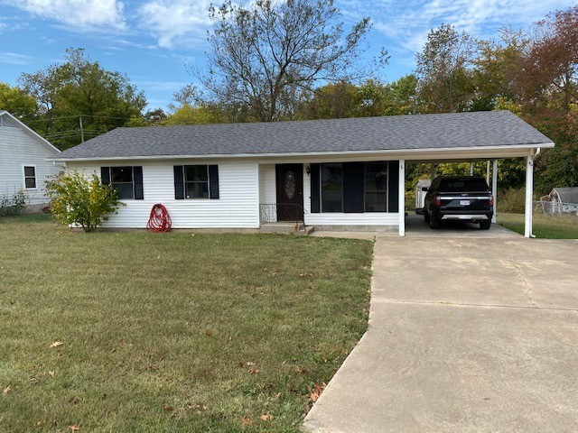 Quaint 3 bedroom home in Gravette! With a large, flat lawn and spacious parking - this is the perfect family home!