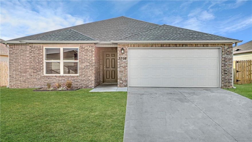 Beautiful Home with 4 bedrooms, spacious living room, open floor plan, beautiful cabinets, split floor plan, all brick exterior, welcoming entryway, close to schools, close to Lowell, parks and trails.