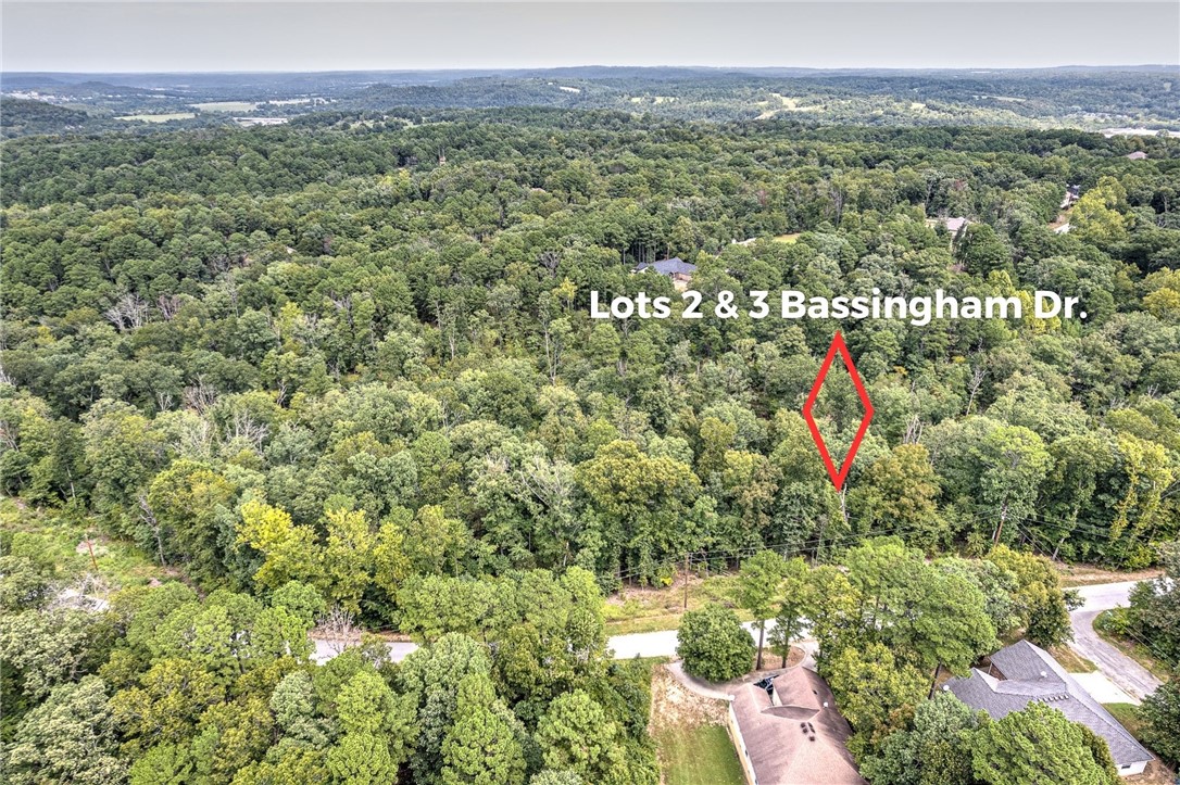 Two lots totaling .61 acres nestled in a quite subdivision in between Scottsdale G/C and Country Club G/C. Common property behind lots and close to Tunnel Vision trailhead as well as Lake Avalon. Be the first to build your home in this area off Bassingham Drive.