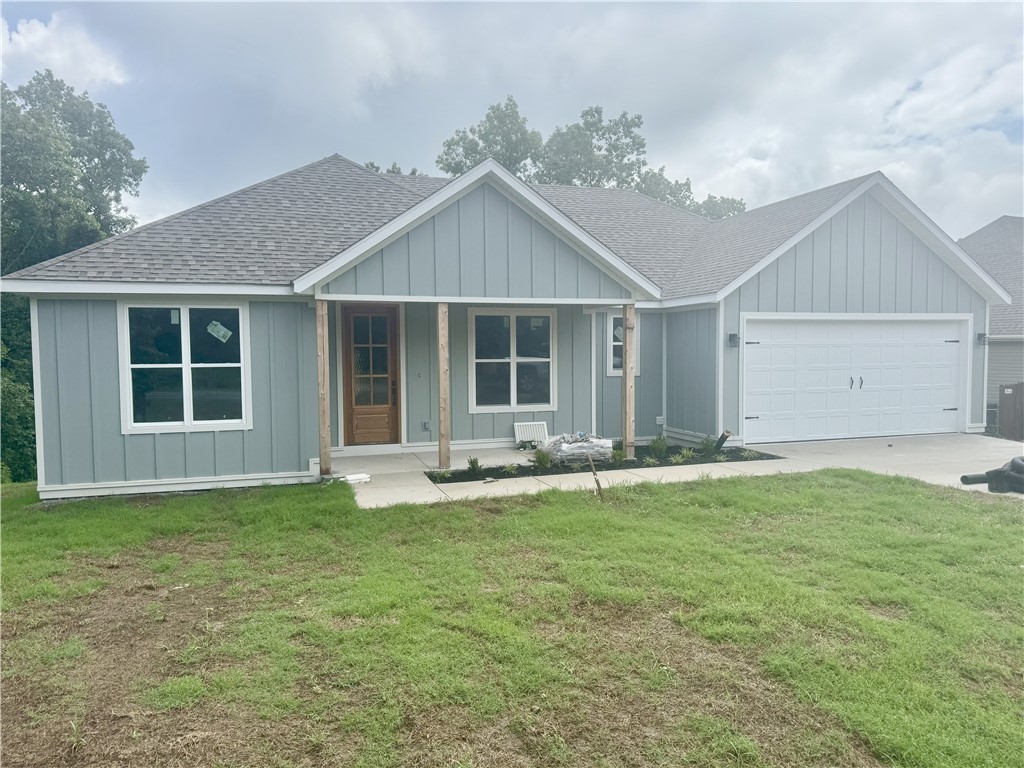 Experience lake-area living in this beautifully designed new construction home near Lake Loch Lomond and less than a mile from the Branchwood Rec Center. Enjoy peaceful views from the expansive covered back deck or relax in the thoughtfully crafted interior. This 3BR/2BA home features a luxurious ownerās suite, spacious laundry room, high-end quartz countertops, custom built-ins, and a nice garage with abundant storage. Built strong and smart by one of Bella Vistaās best builders. Bella Vista offers 9 golf courses, scenic lakes, over 100 miles of trails, and the state's first mountain biking chairlift (coming soon). Whether you're seeking adventure or tranquility, this home delivers both in a vibrant community surrounded by natural beauty. Donāt miss your chance to own a slice of the Bella Vista lifestyleāschedule your showing today!