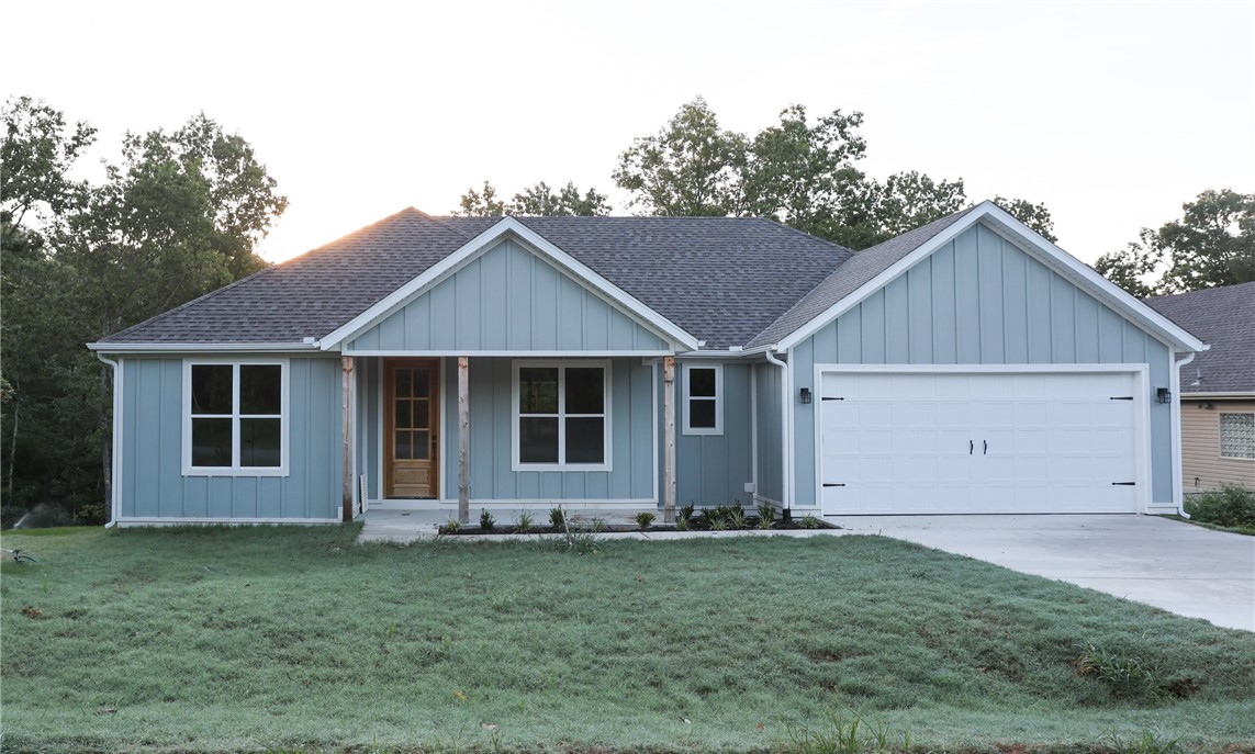 Experience lake-area living in this beautifully designed new construction home near Lake Loch Lomond and less than a mile from the Branchwood Rec Center. Enjoy peaceful views from the expansive covered back deck or relax in the thoughtfully crafted interior. This 3BR/2BA home features a luxurious owner’s suite, spacious laundry room, high-end quartz countertops, custom built-ins, and a nice garage with abundant storage. Built strong and smart by one of Bella Vista’s best builders. Bella Vista offers 9 golf courses, scenic lakes, over 100 miles of trails, and the state's first mountain biking chairlift (coming soon). Whether you're seeking adventure or tranquility, this home delivers both in a vibrant community surrounded by natural beauty. Don’t miss your chance to own a slice of the Bella Vista lifestyle—schedule your showing today!