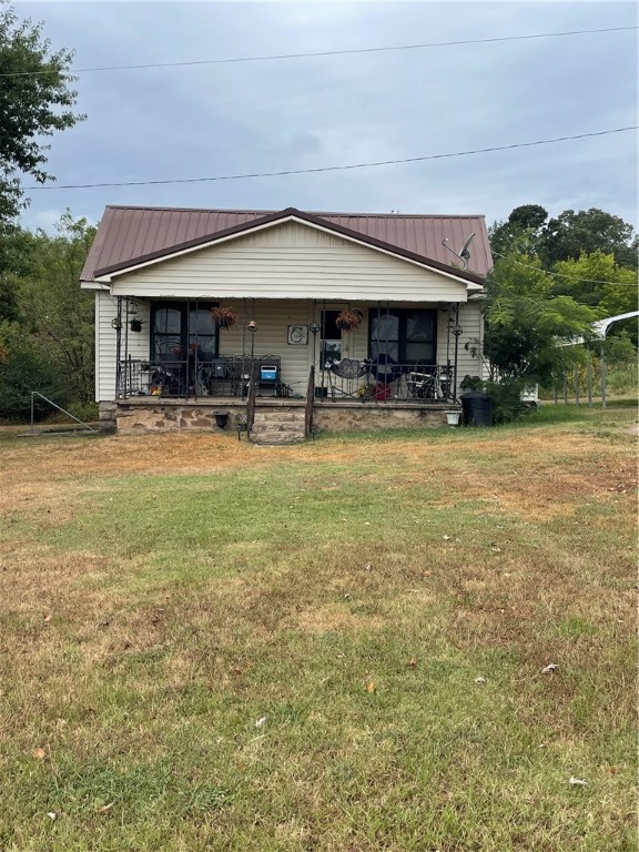 Cute partially updated 2 bedroom 1 bathroom home on 3.45m/l acres with a 20X30 metal building. This property is located in the heart of the River Valley between the Ozark and Quachita mountains. Its also just around the corner from the Arkansas River. Lots of fishing, boating, hunting, and hiking within a few miles from this house