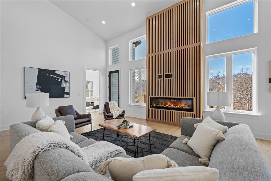 Nestled on a private cul-de-sac with a spacious half-acre lot, this stunning 2-bedroom, 2-bath home offers 1,750 sq. ft. of custom craftsmanship and modern luxury. Inside, you’ll find custom White Oak cabinets throughout, paired with elegant White Oak accent strips in the fireplace and bathrooms. Large custom picture windows bring in natural light and showcase the serene surroundings. The primary bath features a luxurious oversized custom double shower, perfect for unwinding. Sleek, high-end quartz countertops add both style and durability throughout. For outdoor lovers, the Tunnel Vision Bike Trail is just steps from your backyard, offering access to scenic trails. Ample crawlspace storage provides room for seasonal items and more. This home blends comfort, style, and functionality—don’t miss your chance to make it yours! ****Seller is offering a generous Flex Cash incentive toward buyer closing costs, interest rate buy-down, furnishings, or other allowable buyer expenses.