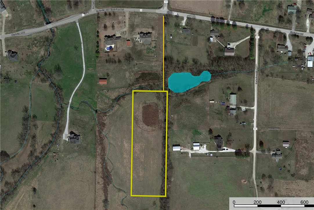 4 beautiful acres in a rural setting but just inside the Prairie Grove city limits. Utilities at the road and water line along east property line. It will require an enhanced septic system similar to adjacent landowners. We have an estimate from Dirt works company to bring in a driveway already. 10.5 acres is also available adjacent to this 4. same pasture. different owner. see MLS 1180053 listed at $115,000