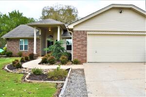 Beautiful updated home in Golden Pond with two acres!!! This fantastic house is move-in ready with gorgeous cabinetry, counter tops, and flooring! You will fall in love with the custom bathrooms and the open and completely updated kitchen. The bedrooms are spacious and the playroom is not only incredibly cute, but would also make a wonderful office or sunroom. Outside, the porch set up is perfect for kids, guests, and all of your favorite outdoor activities! Come check out this exceptional home before it is gone!