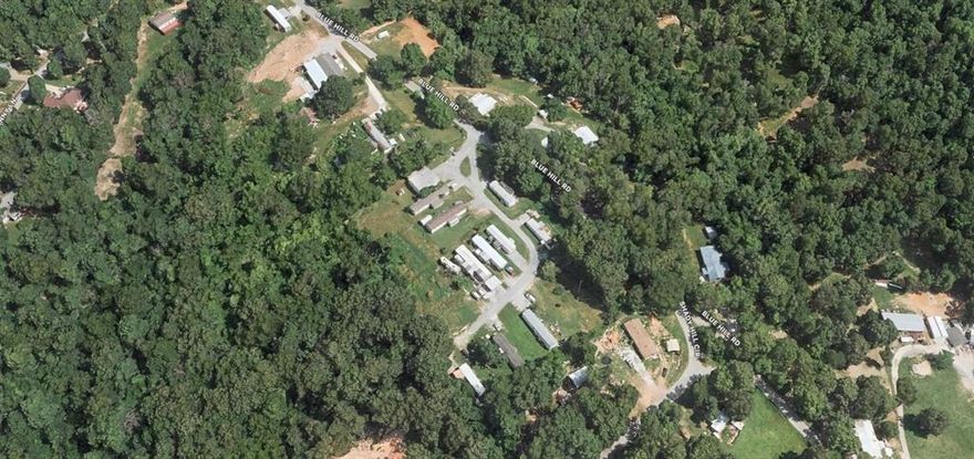 Established income-producing asset in Rogers, AR. This 14-pad mobile home park operates on a land-lease model — tenants own their units, keeping turnover low and maintenance costs minimal for the owner. Eleven pads are currently occupied by long-term tenants ranging from 2 to 10 years at $600/month, generating $6,600/month in pad rent. A metal building on-site is separately owned and leased to a local church at $1,800/month — bringing total current monthly income to $8,400, or $100,800 annually.

Three vacant pads represent immediate upside potential to boost cash flow. A utility billing opportunity also awaits: the park was previously individually metered, and the seller may assist with meter installation post-close, positioning the new owner to bill tenants directly for water usage.

Stable, long-term tenants. Predictable cash flow. Real value-add potential. This is the kind of low-maintenance, income-producing investment that rarely comes to market. Call today to review financials.