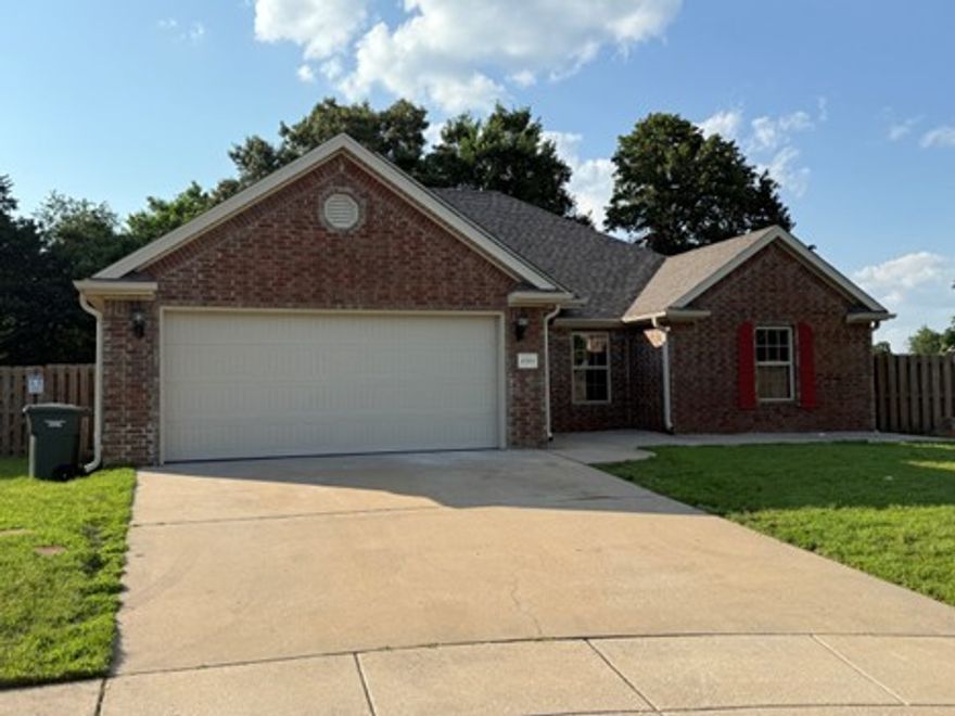 Few Fayetteville houses have the convenience and beauty of this move-in ready home and just minutes away from I540 off the Wedington Exit or the Porter Rd Exit. Beautiful real wood floors grace the living area, the interior is freshly painte, and new carpet and pad installed in the bedrooms. A fireplace is the focal point of the living room. Open floor plan, split bedroom plan provides a retreat for the owner, with his and her closets and vanities in the primary bathroom. Kitchen has granite counter tops and stainless appliances. A screened-in covered patio provides outdoor dining or just relaxing overlooking the yard. Quiet cul-de-sac, storage building and storm shelter as well.  The garage has a newly epoxy painted floor, the walls and ceiling of the garage have also been painted this year along with the interior of the house, and a new garage door and controller installed as well.  Agent Owned.