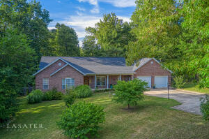 BREATHTAKINGLY BEAUTIFUL Home w/ a private setting, just minutes from Harrison! You'll appreciate the attention to detail in this 3BR/2.5BA,move-in ready home! Vaulted tall ceilings & arched doorways add to the coveted open floor plan as do the GORGEOUS hand-scraped Hickory H-Wood floors that are throughout the living spaces! Custom built/designed Kitchen has TONS of storage & great amenities like Granite countertops, built-in pot filler, hidden mixer stand, & a large pantry! The comforts continue in the Owner's Suite w/ Heated Tile Floors, BIG walk-in Shower, Jetted Garden Tub, & a Custom Designed Walk-In Closet! However, the outdoor space may be best of all! Multi-Level Lighted Deck w/ Large partially covered space, 2 TV mounts, FANTASTIC fire pit & Awesome Landscaping! True MUST-SEE!