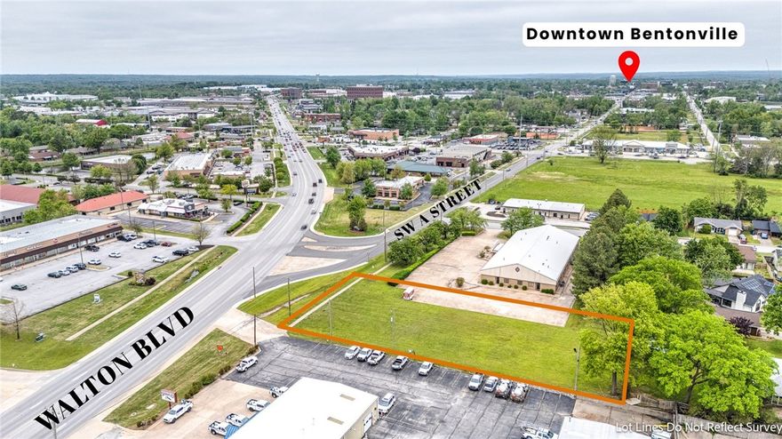 Prime development opportunity at the bustling intersection of SW A Street & Walton Blvd in Bentonville! Currently zoned C-2, this high visibility lot is just minutes from Downtown Bentonville, the new Walmart campus, established commercial and retail, trails and more. With Bentonville's growth showing no signs of slowing, opportunities like this don’t come around often.